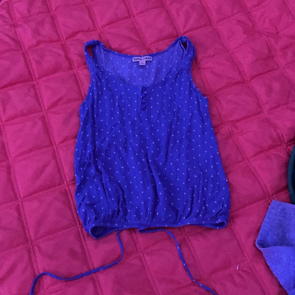 Blue small tank top, with white dots.